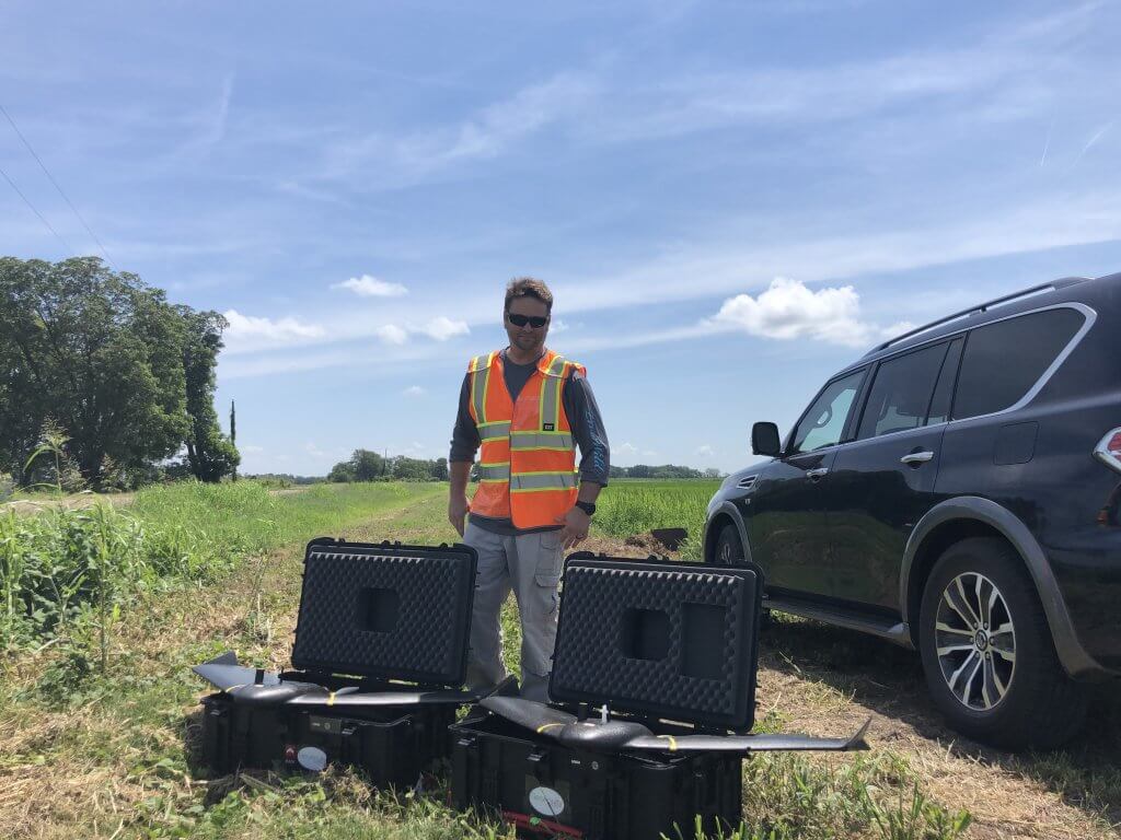 Dr. Jason Knowles, CEO, GeoAcuity with two eBee X fixed-wing drones.